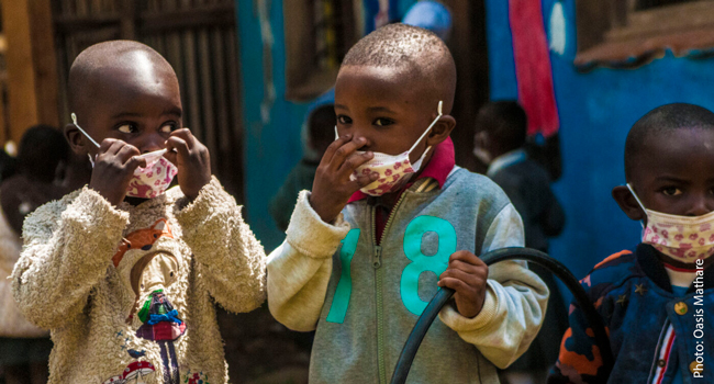 Children wearing masks.
