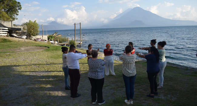 GFC staff and partners taking part in an outdoor group activity at the RECARGA convening in Guatemala.